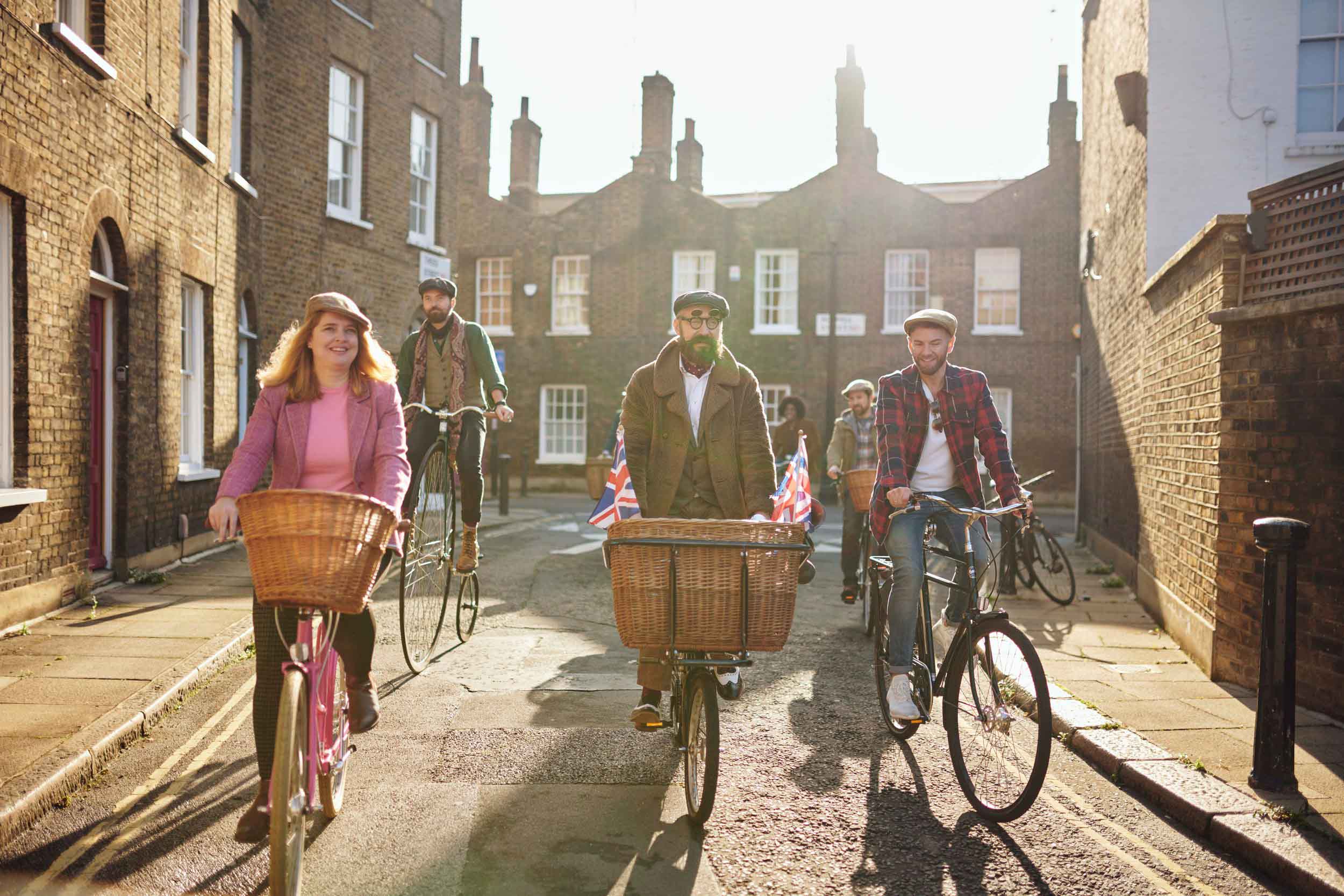 Tally Ho! Guests riding vintage bikes in the back streets of London