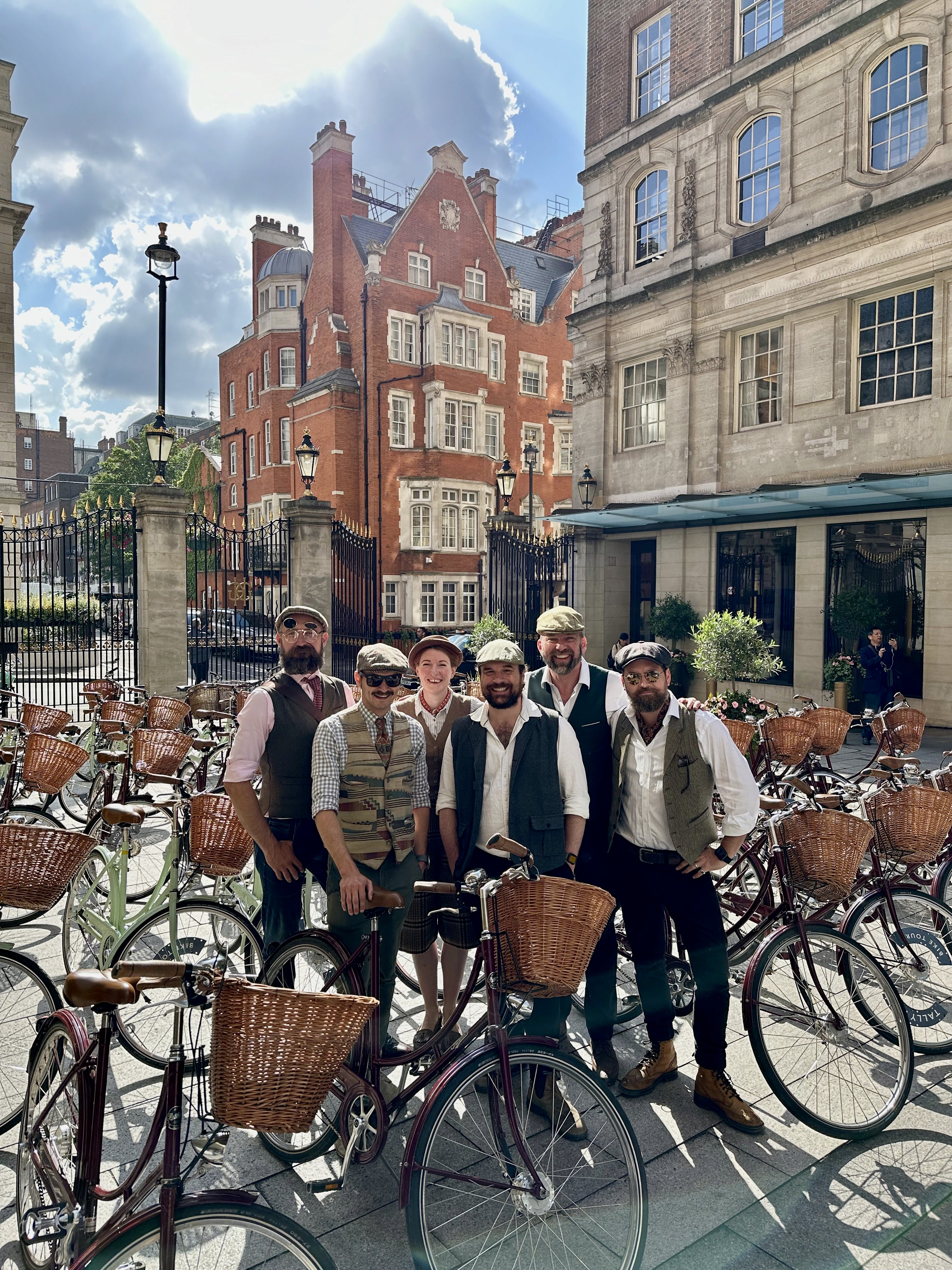 A large group of vintage bicycles assembled in the courtyard of a London hotel 