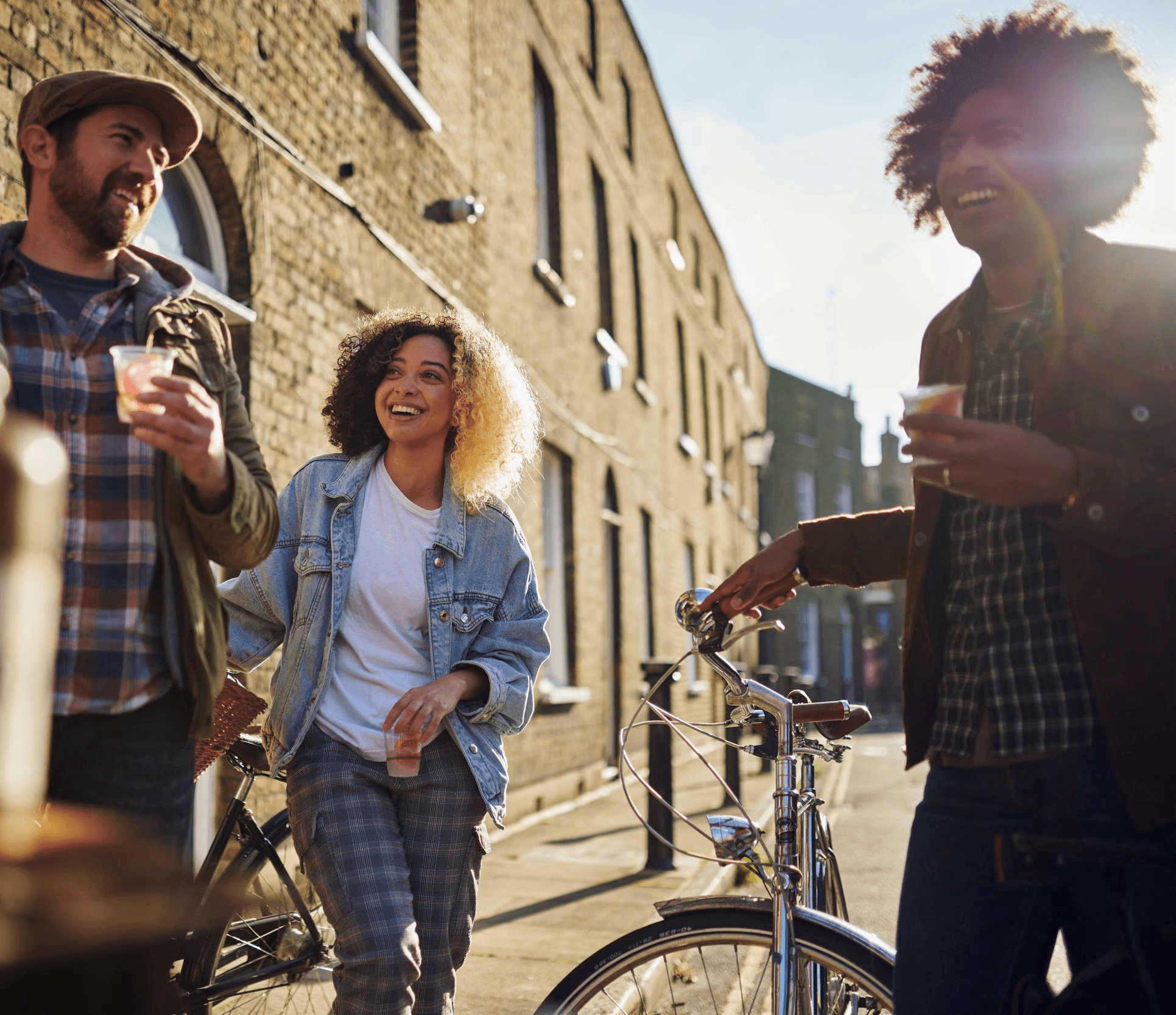 A bike tour in London stops in a historic street for gin tasting with Tally Ho 