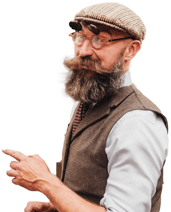 A Tally Ho guide dressed in tweed pointing 